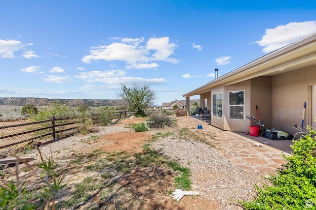881 W Smithsonian Way, Apple Valley, UT 84737 - fenced backyard with a patio