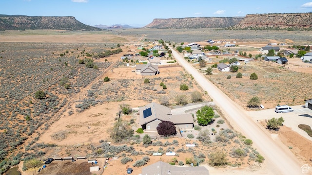 881 W Smithsonian Way, Apple Valley, UT 84737 - aerial view of property and surrounding area with a desert landscape, mountains, and rural landscape