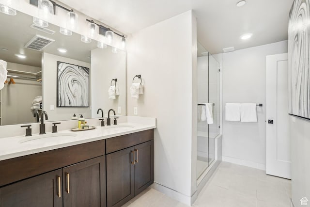 909 W Peace Tree Trl Unit 513, Kamas, UT 84036 - full bath featuring tile patterned floors, a shower stall, double vanity, and baseboards