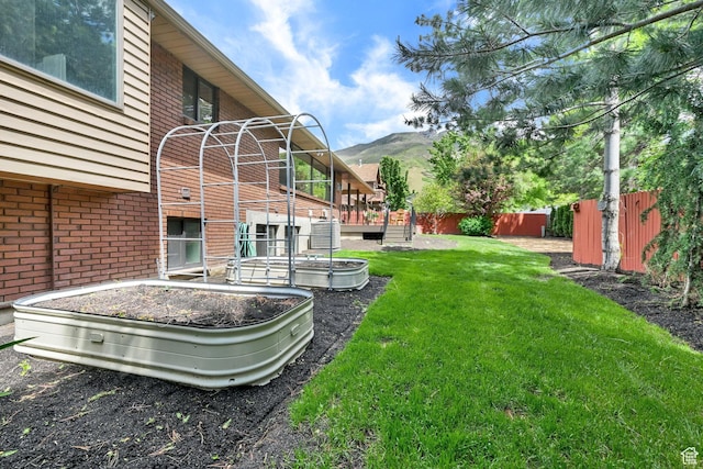 3348 E Stonehill Ln, Cottonwood Heights, UT 84121 - view of yard featuring a deck with mountain view