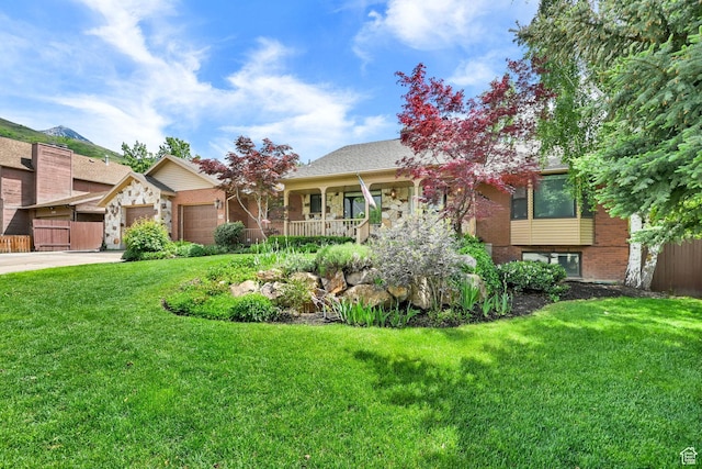 3348 E Stonehill Ln, Cottonwood Heights, UT 84121 - view of front of house with an attached garage, a front lawn, driveway, and brick siding