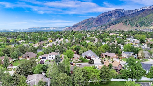 3348 E Stonehill Ln, Cottonwood Heights, UT 84121 - aerial perspective of suburban area featuring a mountainous background