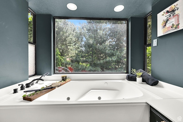 3348 E Stonehill Ln, Cottonwood Heights, UT 84121 - full bath featuring a jetted tub and a textured ceiling