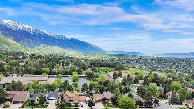 3348 E Stonehill Ln, Cottonwood Heights, UT 84121 - aerial perspective of suburban area with a mountain backdrop
