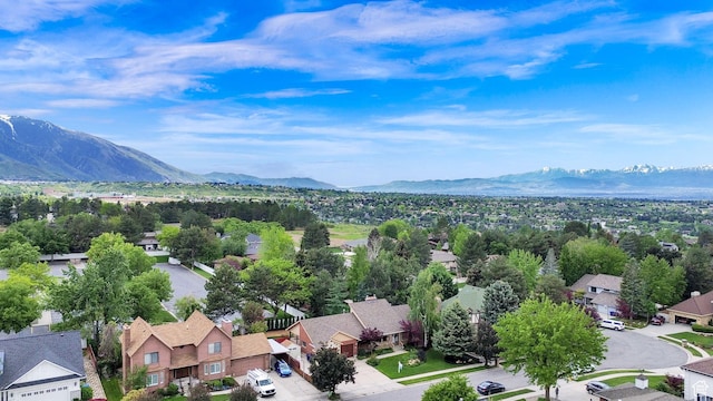 3348 E Stonehill Ln, Cottonwood Heights, UT 84121 - aerial perspective of suburban area with a mountainous background