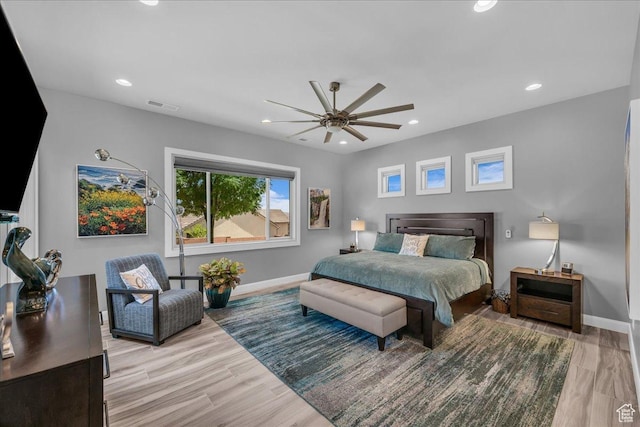 1865 N Park Grove Dr, Washington, UT 84780 - bedroom with baseboards, wood finished floors, recessed lighting, and a ceiling fan