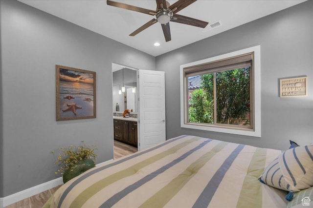 1865 N Park Grove Dr, Washington, UT 84780 - bedroom featuring light wood finished floors, baseboards, ensuite bath, recessed lighting, and ceiling fan