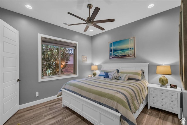 1865 N Park Grove Dr, Washington, UT 84780 - bedroom with wood finished floors, baseboards, recessed lighting, and a ceiling fan