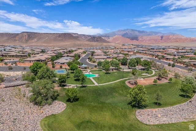 1865 N Park Grove Dr, Washington, UT 84780 - aerial view of property and surrounding area with nearby suburban area and a mountainous background