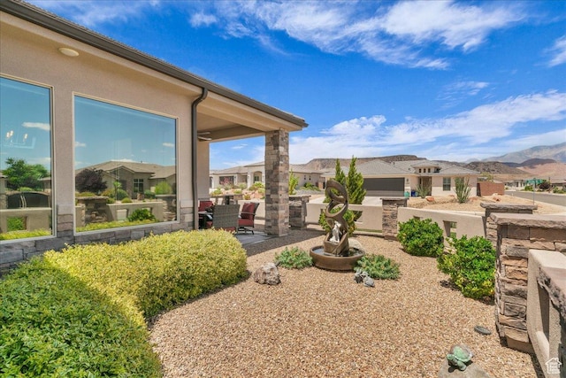 1865 N Park Grove Dr, Washington, UT 84780 - view of yard with a residential view, a mountain view, and a patio