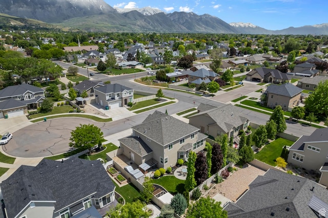 aerial perspective of suburban area with a mountain backdrop
