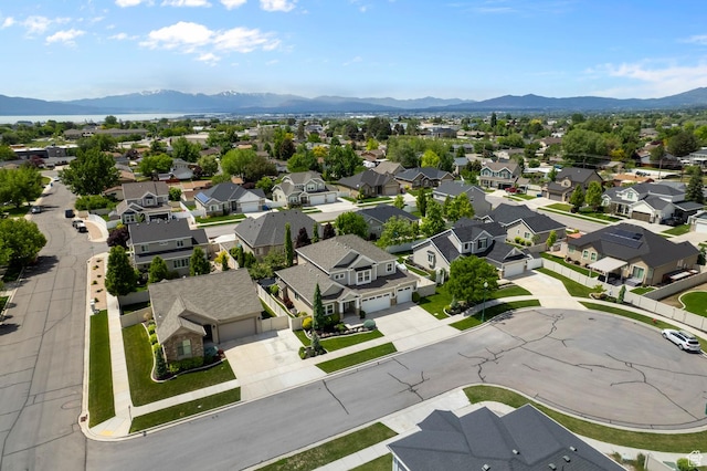 aerial perspective of suburban area featuring a mountainous background