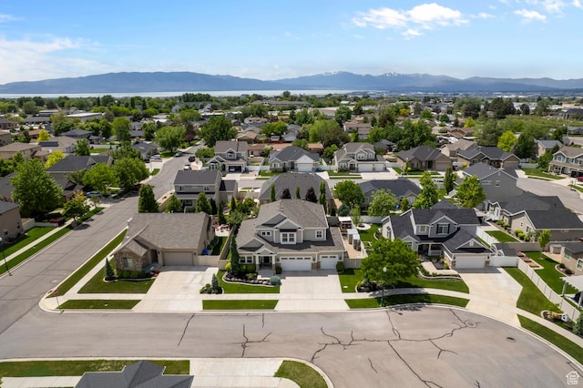 aerial view of residential area with a mountain backdrop