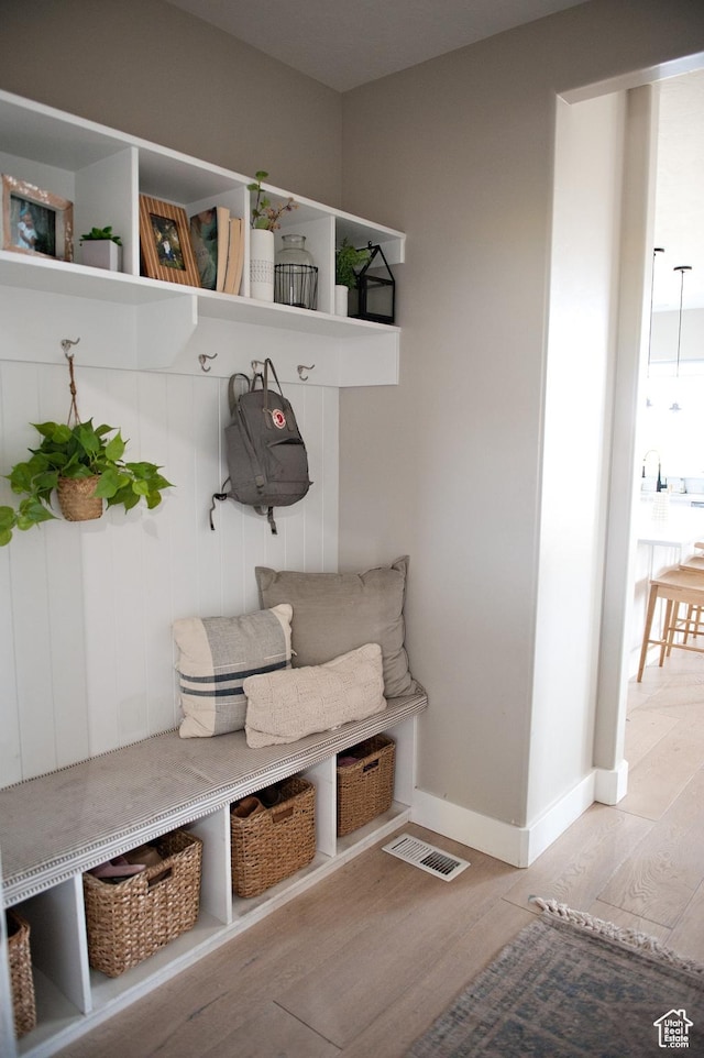 224 S Dry Creek Ln W, Vineyard, UT 84058 - mudroom featuring light wood finished floors and baseboards