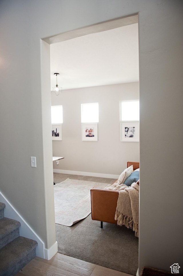224 S Dry Creek Ln W, Vineyard, UT 84058 - living room featuring stairs, baseboards, and carpet