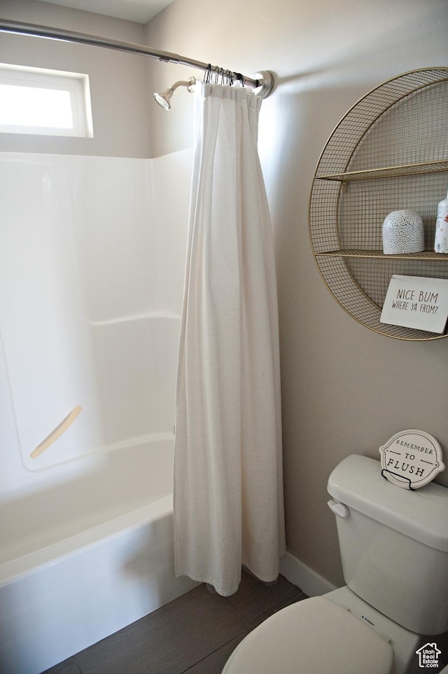 224 S Dry Creek Ln W, Vineyard, UT 84058 - bathroom featuring toilet and shower / tub combo
