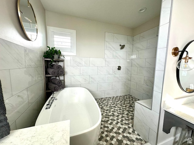 191 E 3475 N, North Ogden, UT 84414 - full bathroom with tile walls, a freestanding tub, tiled shower, and vanity