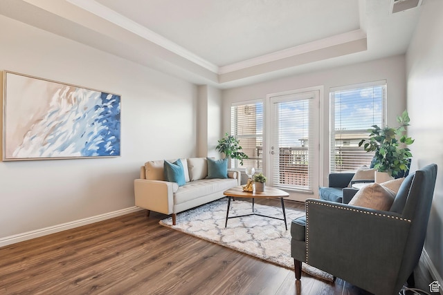 5 S 500 W Unit 506, Salt Lake City, UT 84101 - living room featuring ornamental molding, wood finished floors, a tray ceiling, and baseboards