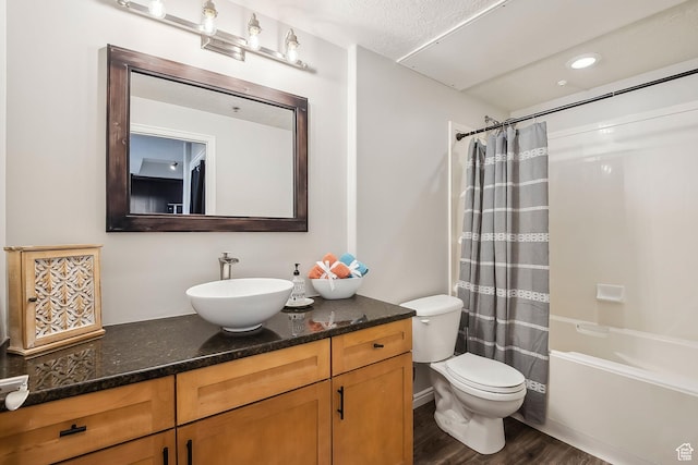 5 S 500 W Unit 506, Salt Lake City, UT 84101 - full bath featuring wood finished floors, toilet, shower / tub combo with curtain, vanity, and recessed lighting