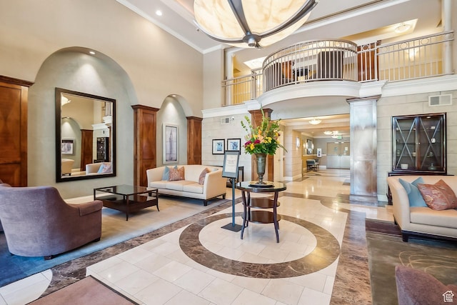 5 S 500 W Unit 506, Salt Lake City, UT 84101 - building lobby featuring a towering ceiling, ornamental molding, and recessed lighting