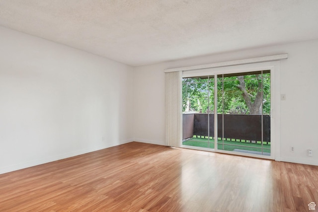 631 N 1200 W Unit A203, Salt Lake City, UT 84116 - empty room featuring wood finished floors and baseboards