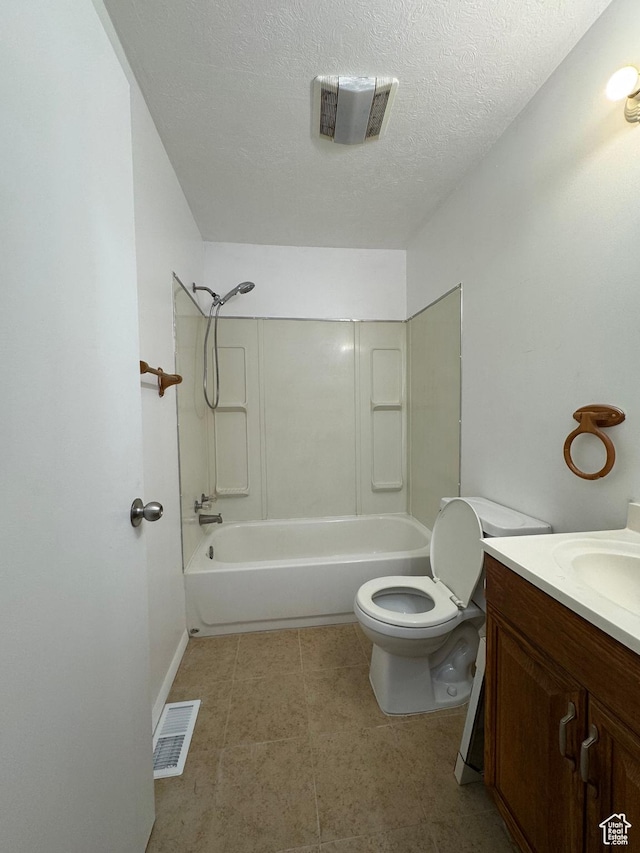 1666 W Warnock St S, Salt Lake City, UT 84119 - bathroom featuring  shower combination, toilet, vanity, a textured ceiling, and baseboards