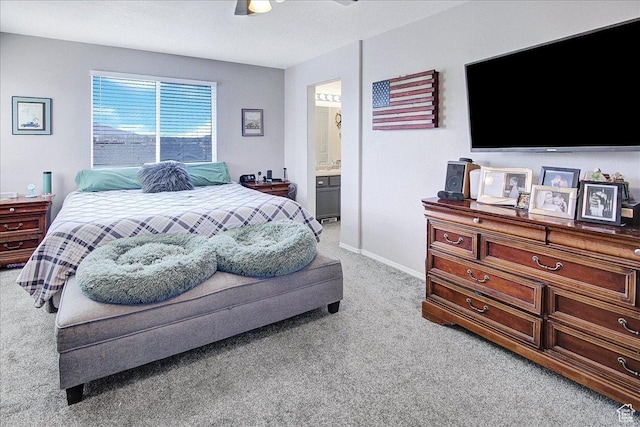 178 W Heidelberg Pl N, Stansbury Park, UT 84074 - bedroom with light colored carpet, ceiling fan, ensuite bathroom, and baseboards
