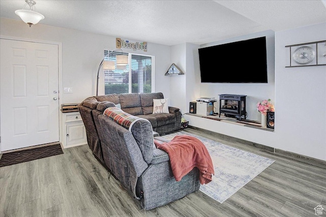 178 W Heidelberg Pl N, Stansbury Park, UT 84074 - living room featuring wood finished floors and a textured ceiling
