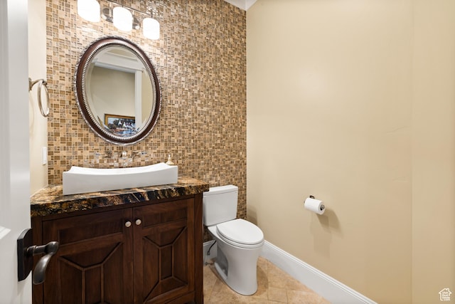 1515 E Maple St, Mapleton, UT 84664 - half bathroom featuring tile walls, toilet, tile patterned flooring, and vanity