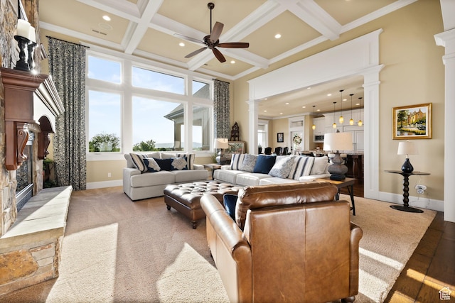 1515 E Maple St, Mapleton, UT 84664 - living area with decorative columns, ceiling fan, a high ceiling, baseboards, and a glass covered fireplace