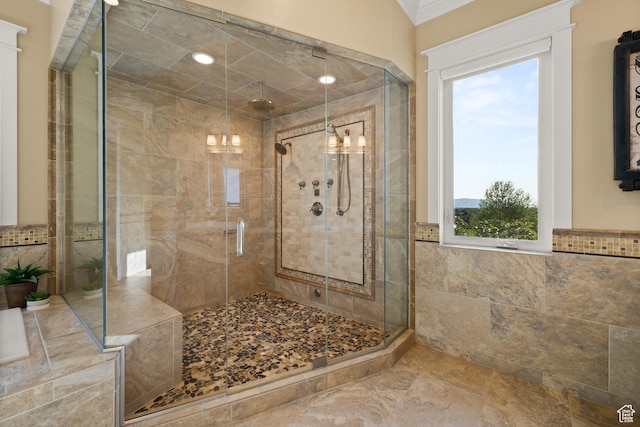 1515 E Maple St, Mapleton, UT 84664 - full bathroom with a shower stall, tile walls, and crown molding