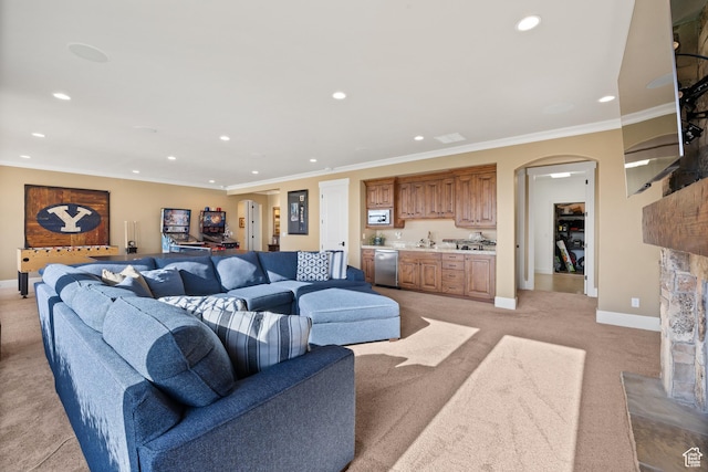 1515 E Maple St, Mapleton, UT 84664 - living area featuring light colored carpet, recessed lighting, baseboards, arched walkways, and crown molding