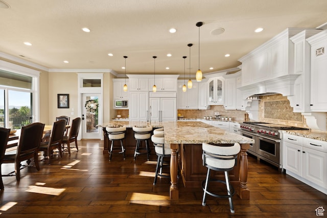 1515 E Maple St, Mapleton, UT 84664 - kitchen with built in appliances, white cabinets, dark wood-style floors, tasteful backsplash, and ornamental molding