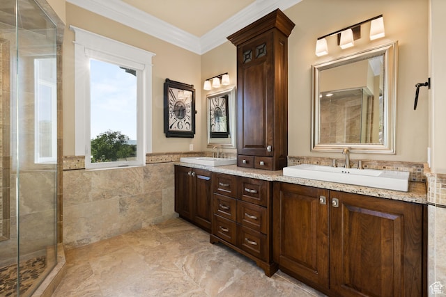 1515 E Maple St, Mapleton, UT 84664 - full bathroom featuring tile walls, a tile shower, crown molding, double vanity, and wainscoting