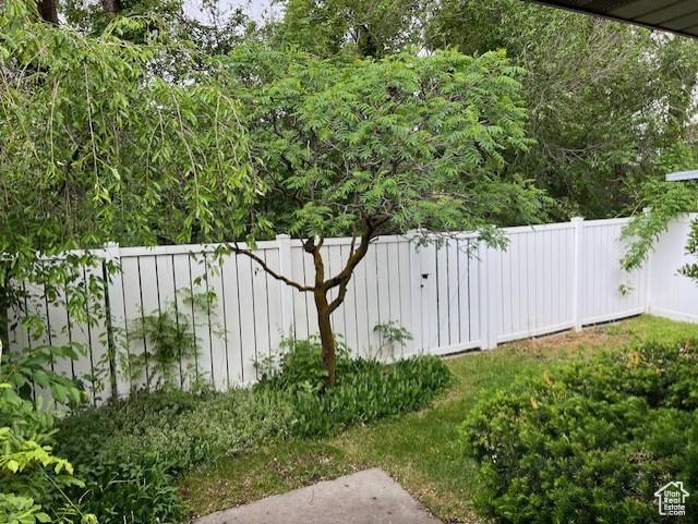 view of yard with fence