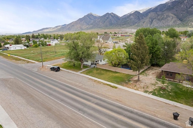 view of mountain backdrop with nearby suburban area