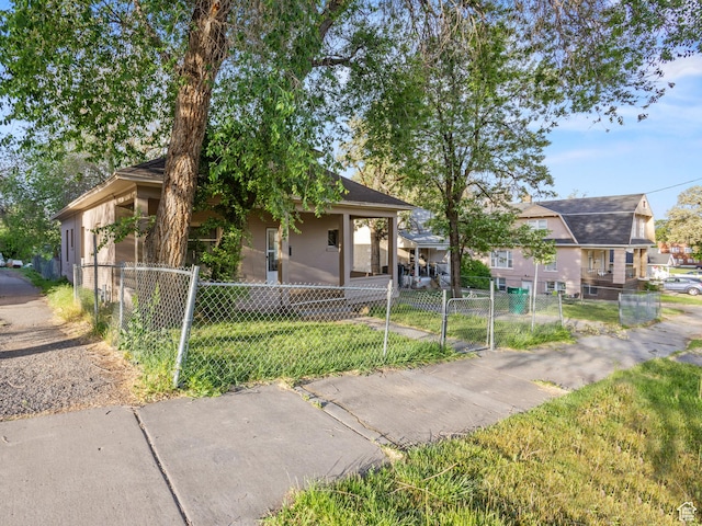 551 E 27th St, Ogden, UT 84403 - view of front of property with a gate