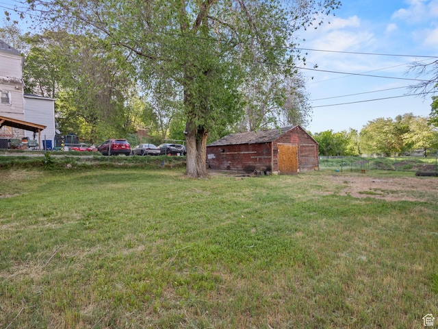 551 E 27th St, Ogden, UT 84403 - view of yard featuring a storage shed and an outbuilding