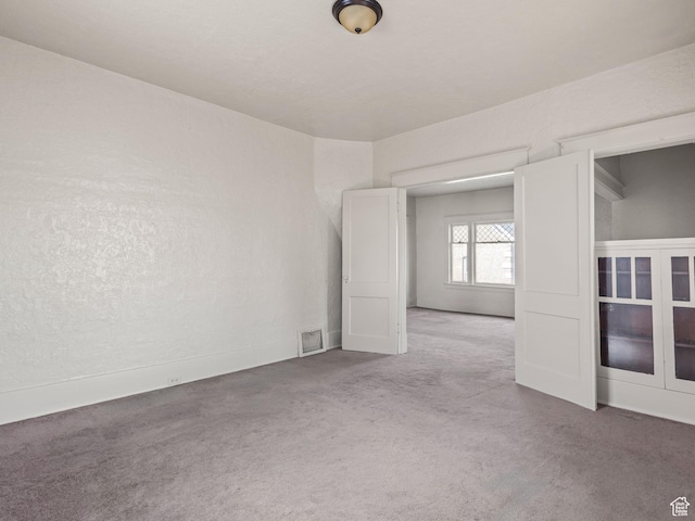 551 E 27th St, Ogden, UT 84403 - empty room featuring carpet