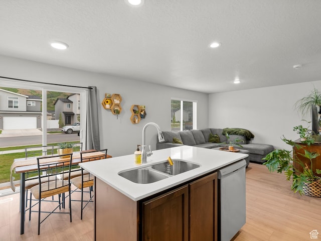 3957 S White Ash Dr, Mapleton, UT 84664 - kitchen with a sink, dishwasher, open floor plan, light countertops, and recessed lighting