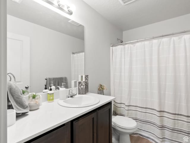 3957 S White Ash Dr, Mapleton, UT 84664 - bathroom with toilet, vanity, and a shower with curtain