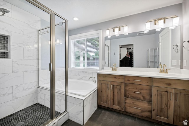 bathroom featuring a stall shower, a bath, tile patterned flooring, a walk in closet, and recessed lighting