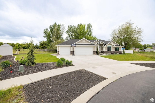 craftsman house with an attached garage and concrete driveway
