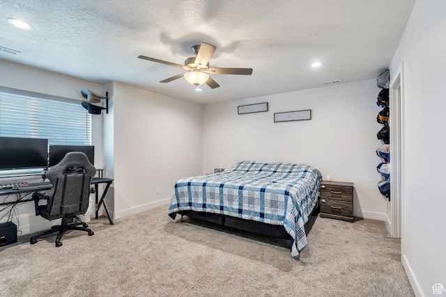 bedroom featuring carpet, ceiling fan, baseboards, recessed lighting, and a desk