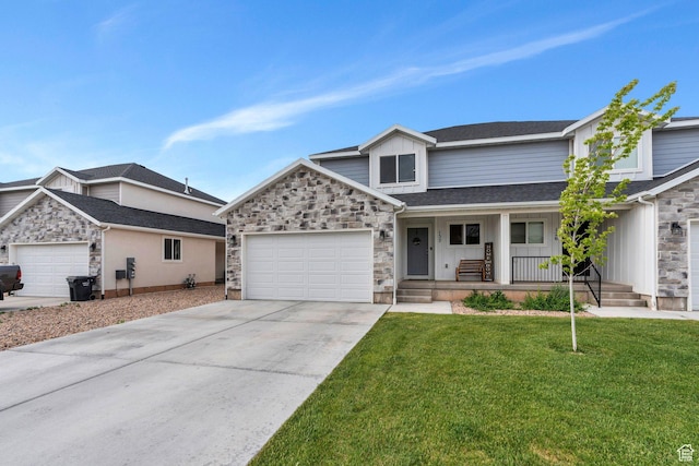 view of front of home featuring stone siding, a porch, driveway, a garage, and board and batten siding