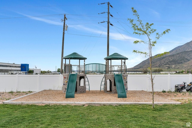communal playground with a mountain view