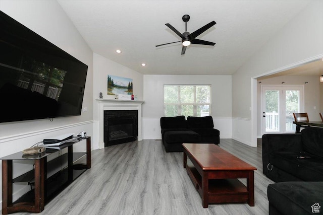 375 S 900 E, Smithfield, UT 84335 - living room featuring a ceiling fan, wood finished floors, a glass covered fireplace, lofted ceiling, and recessed lighting