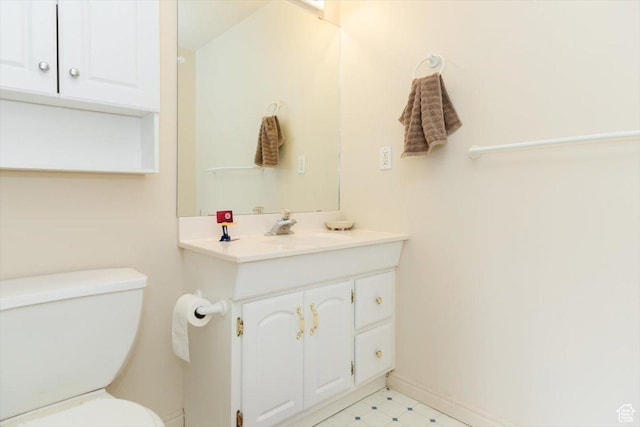 375 S 900 E, Smithfield, UT 84335 - half bathroom with toilet, vanity, baseboards, and tile patterned floors