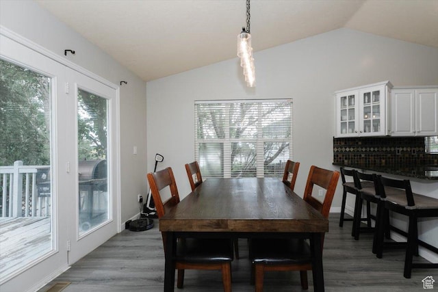 375 S 900 E, Smithfield, UT 84335 - dining room featuring vaulted ceiling and light wood-type flooring