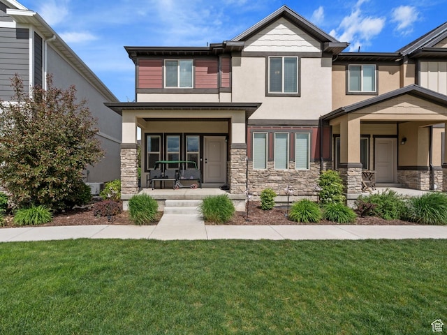 715 N 2560 E, Spanish Fork, UT 84660 - view of front facade with a porch, stucco siding, and stone siding